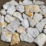 Diverse selection of irregular flagstone pavers for outdoor spaces