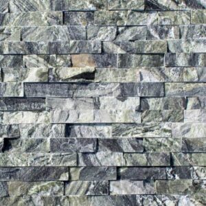 Stacked stone ledger panels in black and green hues