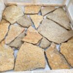 Variety of irregular flagstone pavers in natural colors