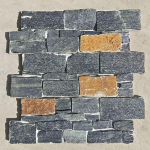 A close-up view of black quartz stacked stone panels.