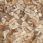 Collection of irregular flagstone pavers in various shapes and colors