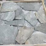 Collection of irregular flagstone pavers in various shapes and sizes.